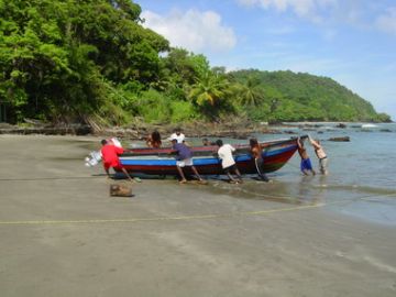 Photo 8. Project boat bought with Darwin funds in Matelot Bay.